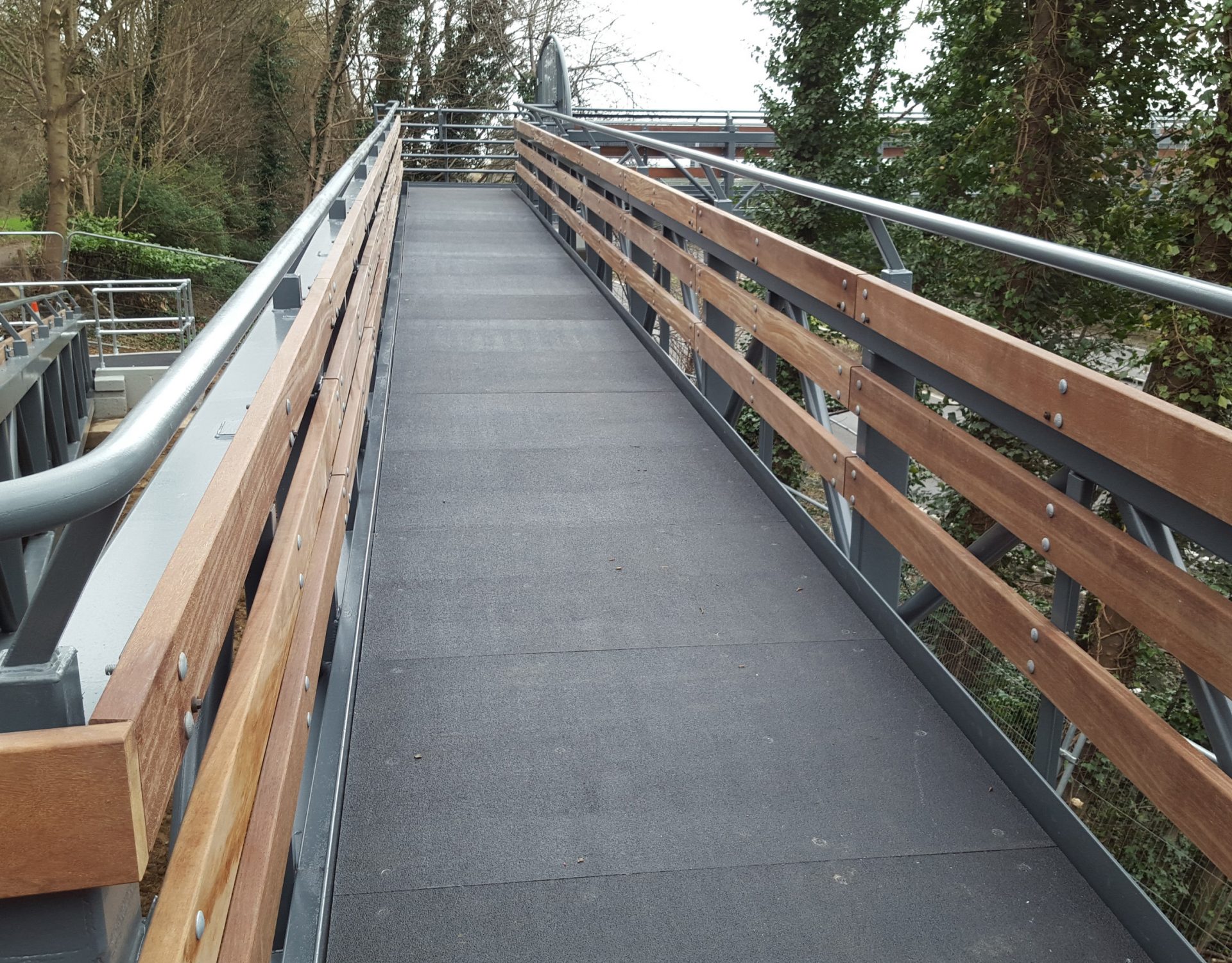 GRP deck pedestrian access walkway retail centre steel structure