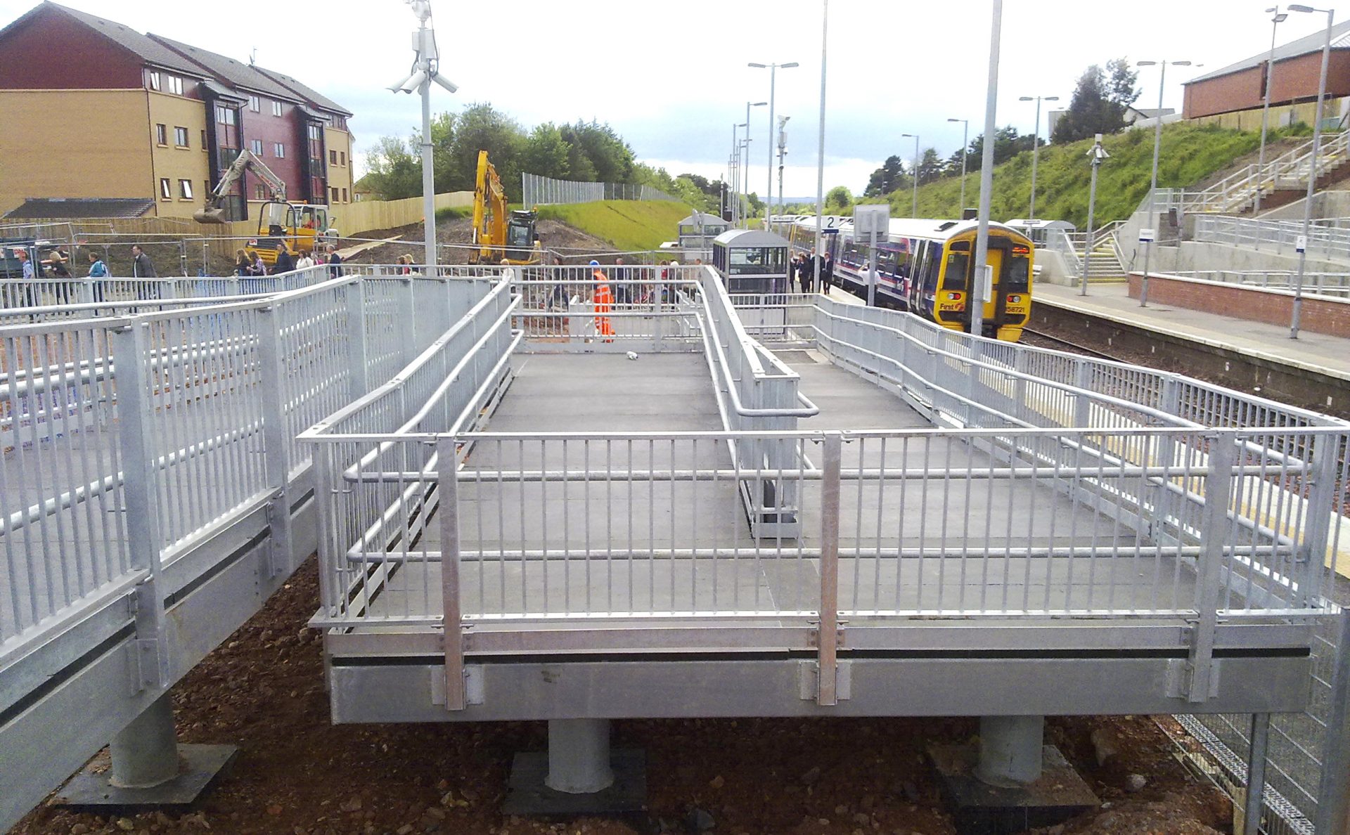 GRP deck pedestrian walkway railway station access ramp with steel structure